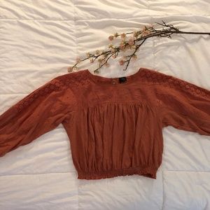 Cropped long sleeve blouse